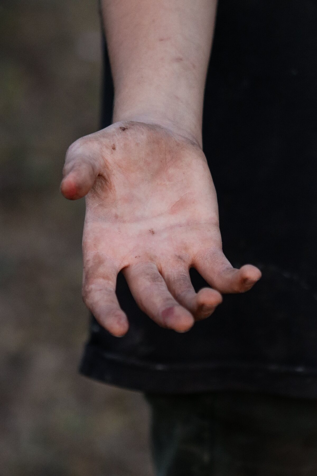 Close view of a child's working hands.